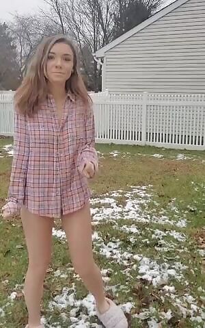 Hot babe strips in her backyard