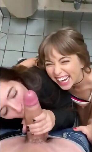 Double blowjob in public toilet