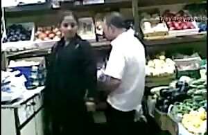 This woman in hijab doesn't have to pay in cash or card for her groceries