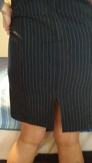 Bigger than you thought booty reveal from the home office secretary.