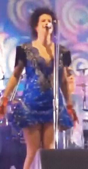 Incredibly gorgeous hot sexy multi-talented married singer Régine Chassagne easily seduces all the black men in the audience. Being perfectly aware of how badly they want to forcefully bang & creampie her. Getting herself corruptly pregnant with their children. As their loyal pregnancy-goddess.