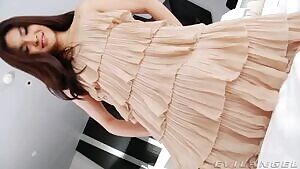 Momo T lifts her dress