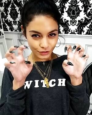 Vanessa Hudgens showing off her sexy black claws. She’s going to use them to mark what’s hers. Cupping and slightly digging them into your balls. And then really driving you crazy, when she’s slowly running them up and down on your hard, pulsating shaft, using just the tip to tease your frenulum...