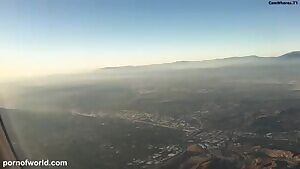 Flashing on an airplane. beauty with big tits