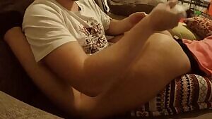 Teasing her while watching TV