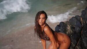 Alexis Ren shooting for Sports Illustrated