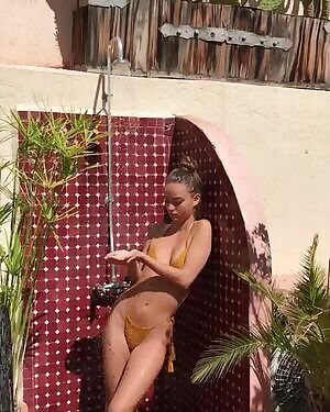 Showering Inka Williams displaying her tight body