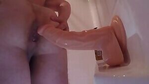 Hairy guy takes big dildo