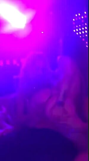 Woman twerks on guy at stripclub