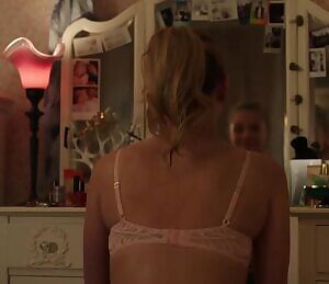 Lili Reinhart in a pink bra