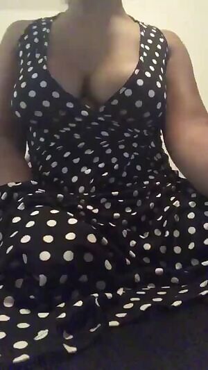 Something big under her dress
