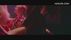 Nikki Fritz and Tane McClure in the strip club scene from 