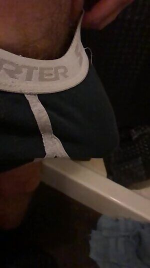 Stripping down after a long day.