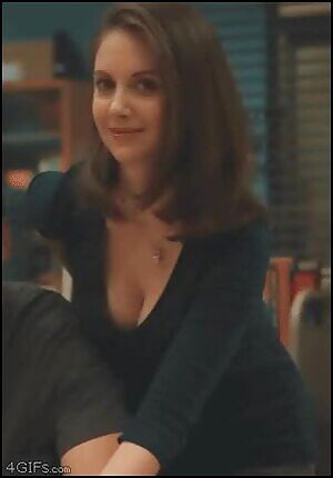 Alison Brie making sure we have a good view of her cleavage