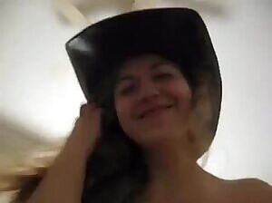 Pretty cowgirl riding a cock