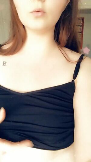 elt like showing what’s hiding under this tight black tank top 💋