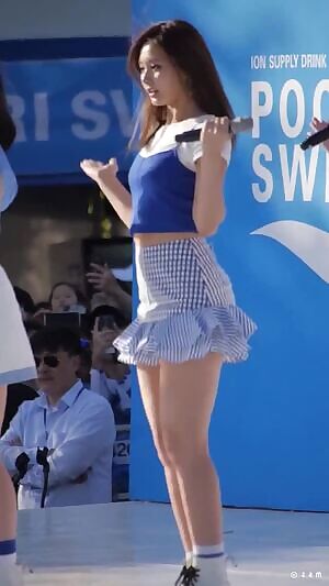 Nayeon patting Tzuyu's bottom