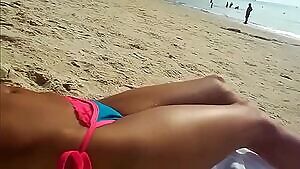 Sexy navel on display at the beach