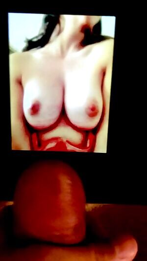 Cumshot between Alison Brie’s big tits