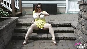 Maria Moore waiting on the stairs for you