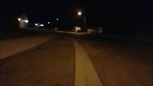 Nude under a street light with a cock ring