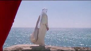 Young Catherine Zeta Jones sea-shell plot in 