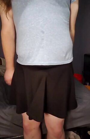 Can you tell I'm hiding something under my skirt?