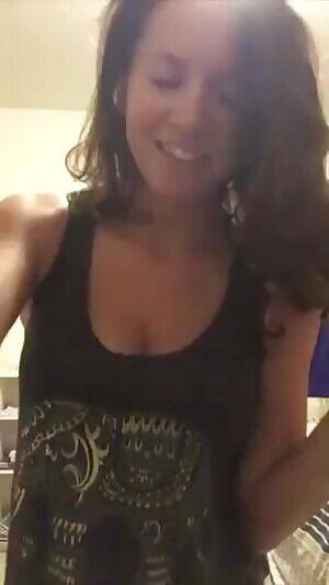 Busty babe strips it all off