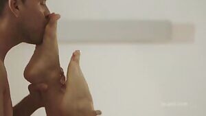 Kissing her toes while thrusting