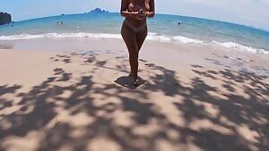 I was swimming topless on a very non-nude beach near them