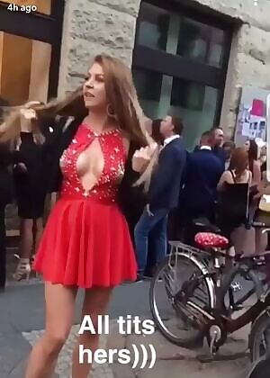 Redhead babe shows boobs unnoticed