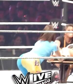 Bayley's tight body and plump ass in position.