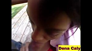 Dena Caly gobbling down big cock