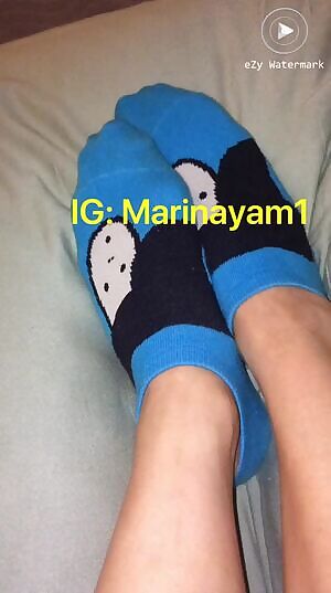 long toes Asian showing off socks and feet in this short gyf