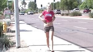 Cute blonde flashing on the street
