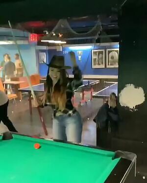 Asian hottie, dressed up Texan.