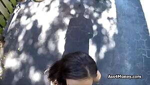 Ebony teen cocked on a bike