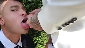 best man feeding the groom before the wedding