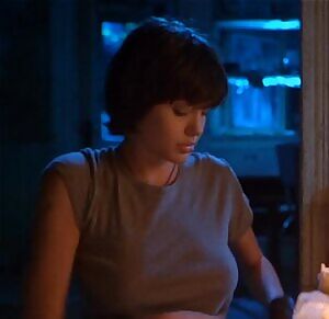 Angelina Jolie stripping off her shirt