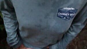 My wife showing off her tits while I finger her pussy in the middle of a public forest