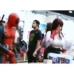 Deadpool performs a public