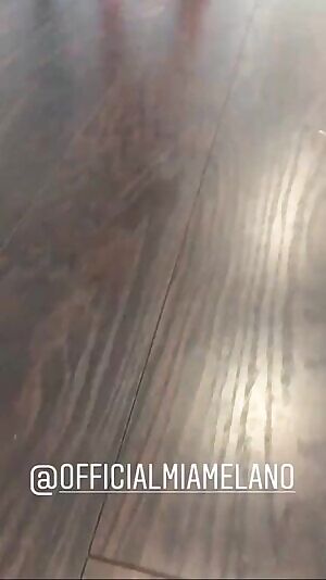 Mia becomes the photographer