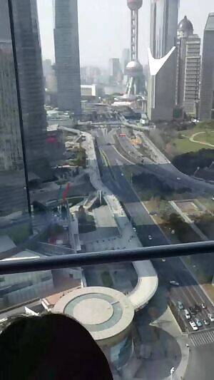 Looking out the penthouse window