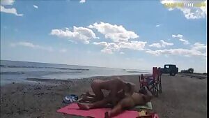 Curious naked guests on the beach.