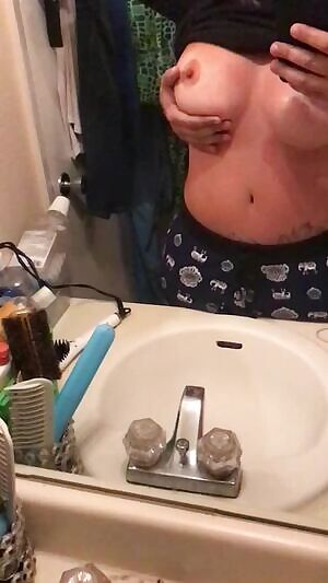 Shaking right boob in slow motion.