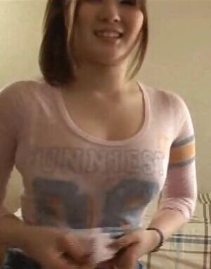 Cute Japanese girl reveals her assets