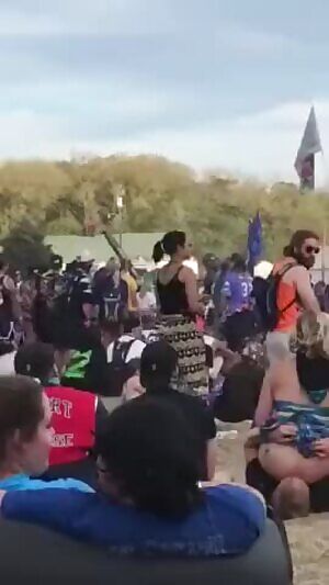 Slutty girl gets her ass ate in public festival by two guys