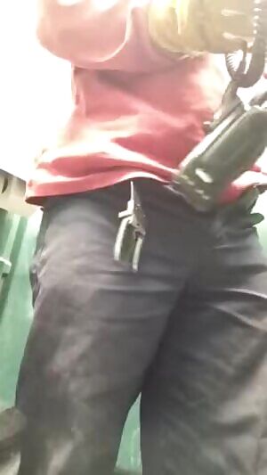 Hung construction worker shows off