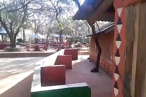 pissing in a bottle in public behind a restaurant