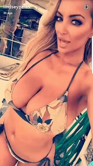 Lindsey Pelas trying on some boots